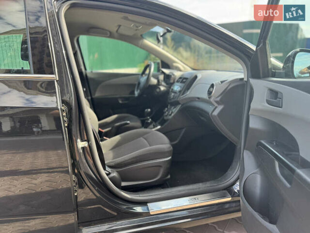 Черный Шевроле Авео, объемом двигателя 1.6 л и пробегом 124 тыс. км за 6350 $, фото 11 на Automoto.ua