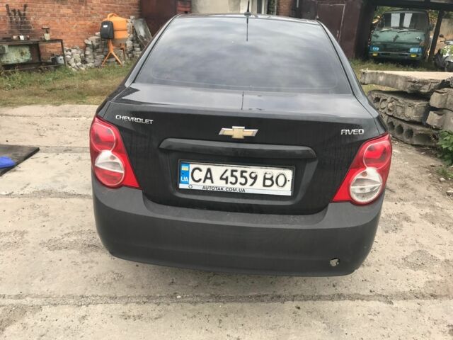 Черный Шевроле Авео, объемом двигателя 1.4 л и пробегом 170 тыс. км за 5500 $, фото 2 на Automoto.ua