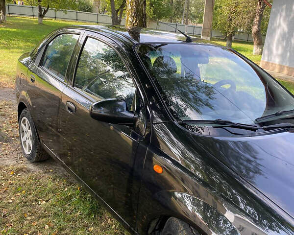 Черный Шевроле Авео, объемом двигателя 1.5 л и пробегом 215 тыс. км за 3138 $, фото 4 на Automoto.ua