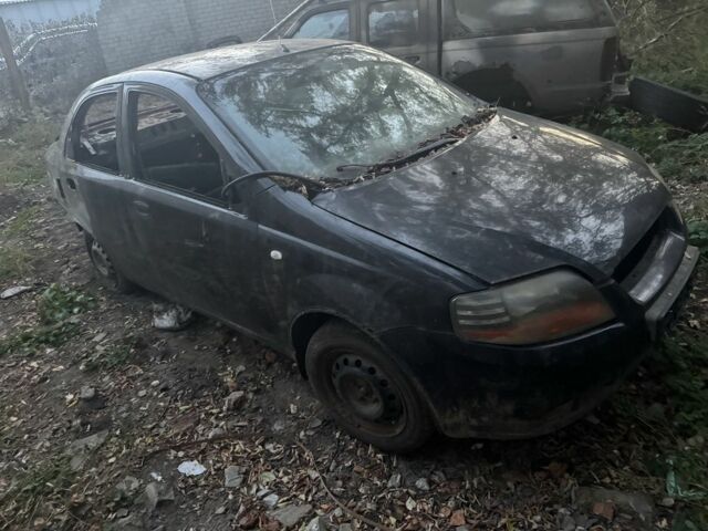 Черный Шевроле Авео, объемом двигателя 1.5 л и пробегом 200 тыс. км за 639 $, фото 1 на Automoto.ua