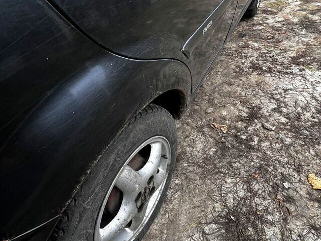 Черный Шевроле Авео, объемом двигателя 1.5 л и пробегом 211 тыс. км за 1800 $, фото 5 на Automoto.ua