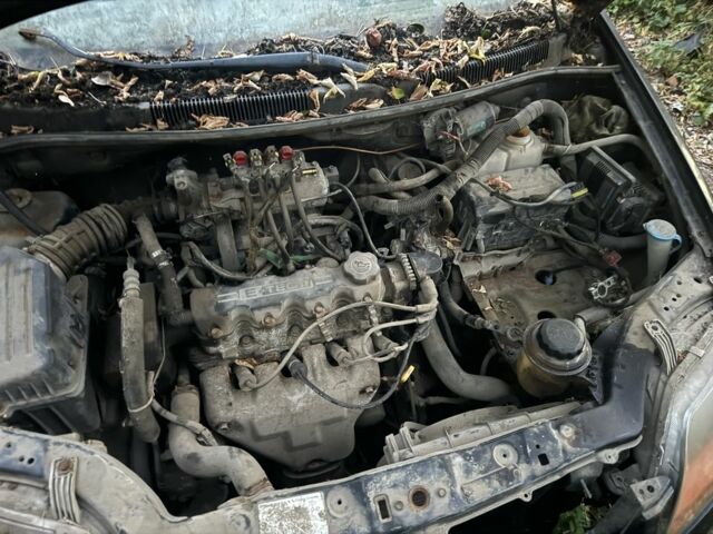 Черный Шевроле Авео, объемом двигателя 1.5 л и пробегом 200 тыс. км за 639 $, фото 2 на Automoto.ua