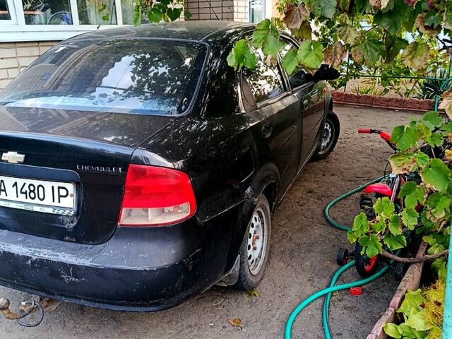 Черный Шевроле Авео, объемом двигателя 1.5 л и пробегом 240 тыс. км за 1300 $, фото 2 на Automoto.ua