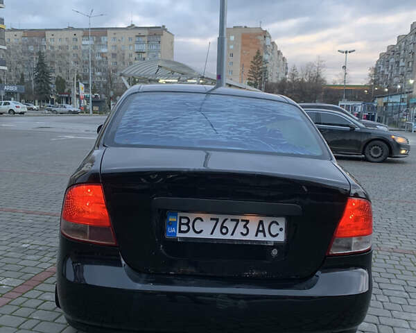 Черный Шевроле Авео, объемом двигателя 1.6 л и пробегом 300 тыс. км за 1499 $, фото 5 на Automoto.ua