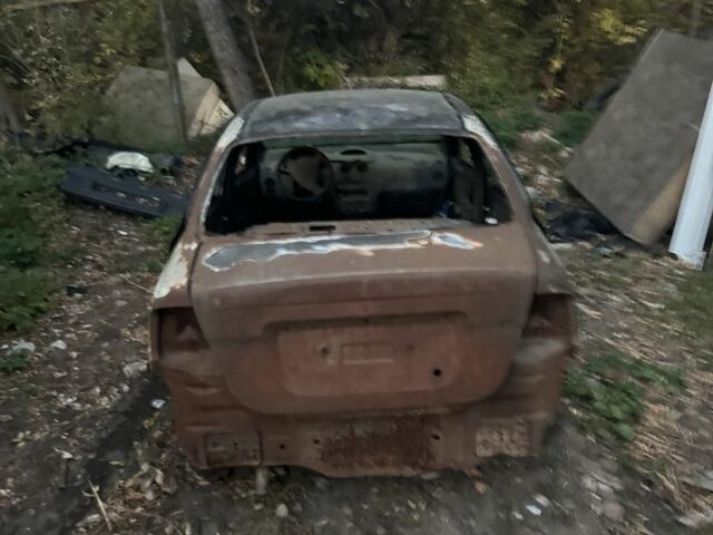 Черный Шевроле Авео, объемом двигателя 1.5 л и пробегом 200 тыс. км за 639 $, фото 4 на Automoto.ua