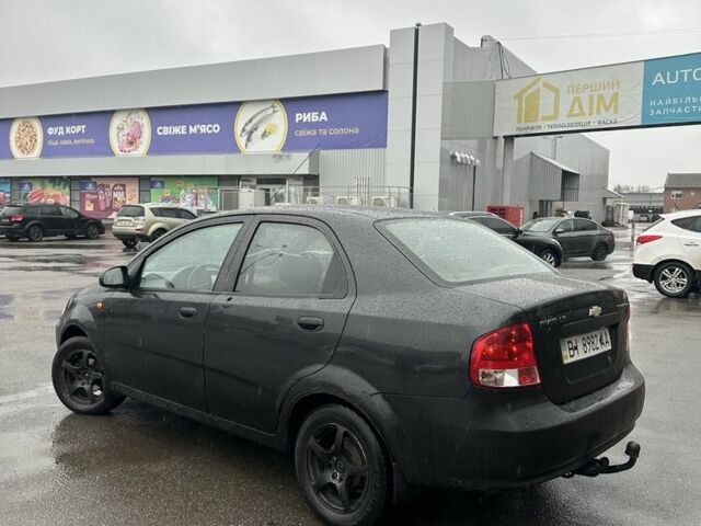 Черный Шевроле Авео, объемом двигателя 1.5 л и пробегом 200 тыс. км за 1450 $, фото 4 на Automoto.ua