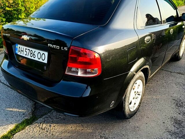 Черный Шевроле Авео, объемом двигателя 1.5 л и пробегом 300 тыс. км за 2600 $, фото 3 на Automoto.ua