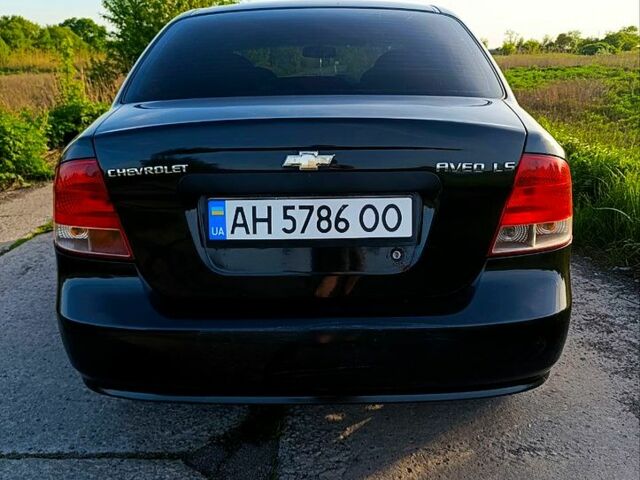 Черный Шевроле Авео, объемом двигателя 1.5 л и пробегом 300 тыс. км за 2600 $, фото 2 на Automoto.ua