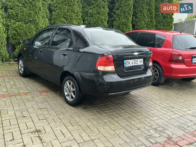 Чорний Шевроле Авео, об'ємом двигуна 1.5 л та пробігом 350 тис. км за 2600 $, фото 6 на Automoto.ua