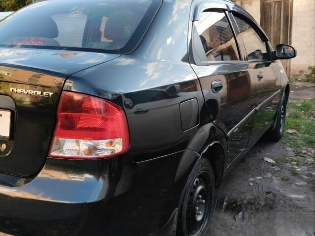 Чорний Шевроле Авео, об'ємом двигуна 1.5 л та пробігом 209 тис. км за 2800 $, фото 2 на Automoto.ua
