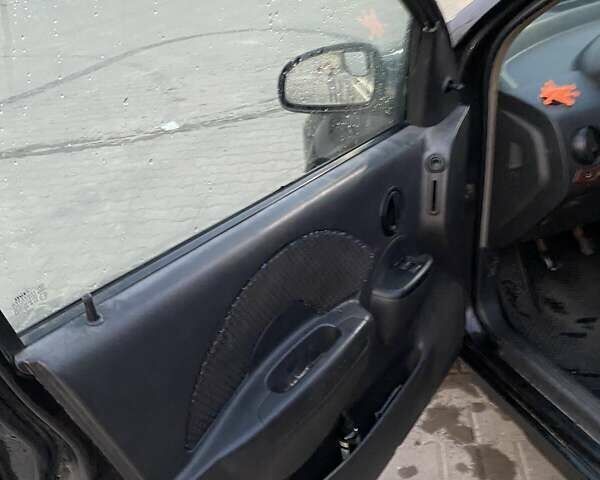 Черный Шевроле Авео, объемом двигателя 1.5 л и пробегом 250 тыс. км за 1650 $, фото 7 на Automoto.ua