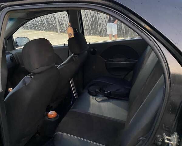 Черный Шевроле Авео, объемом двигателя 1.5 л и пробегом 250 тыс. км за 1650 $, фото 6 на Automoto.ua