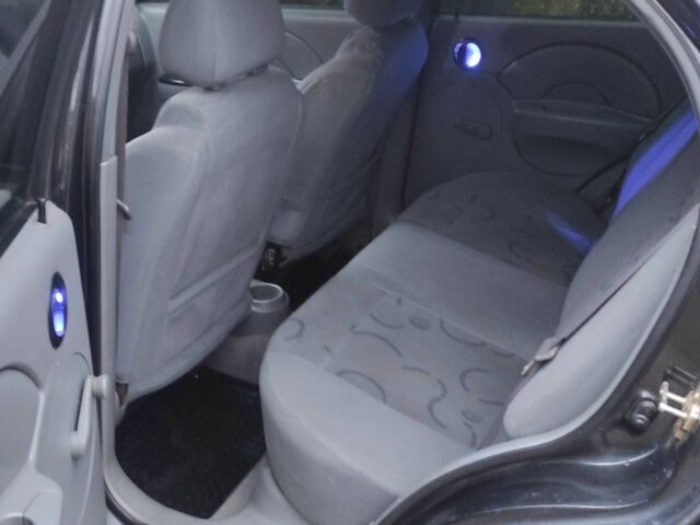 Черный Шевроле Авео, объемом двигателя 1.5 л и пробегом 170 тыс. км за 3108 $, фото 8 на Automoto.ua