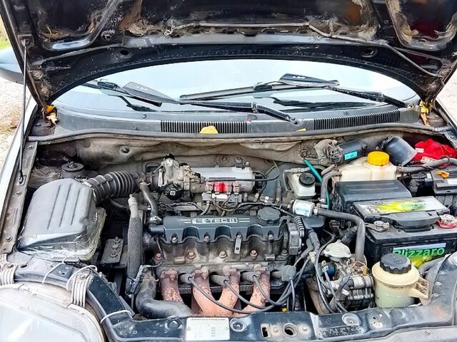 Черный Шевроле Авео, объемом двигателя 1.5 л и пробегом 370 тыс. км за 2500 $, фото 2 на Automoto.ua