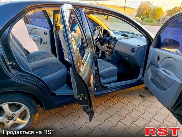 Черный Шевроле Авео, объемом двигателя 1.5 л и пробегом 195 тыс. км за 2650 $, фото 6 на Automoto.ua