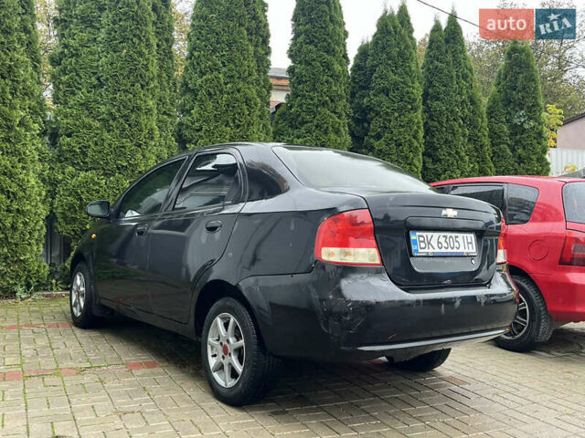 Чорний Шевроле Авео, об'ємом двигуна 1.5 л та пробігом 350 тис. км за 2600 $, фото 5 на Automoto.ua
