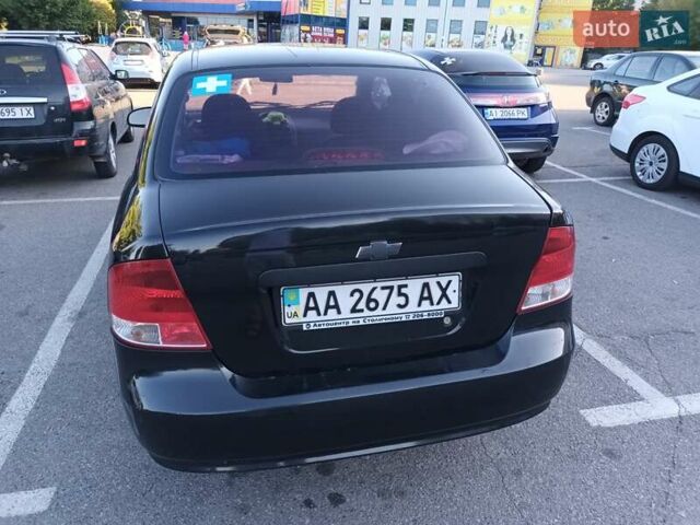 Черный Шевроле Авео, объемом двигателя 1.5 л и пробегом 322 тыс. км за 1900 $, фото 1 на Automoto.ua