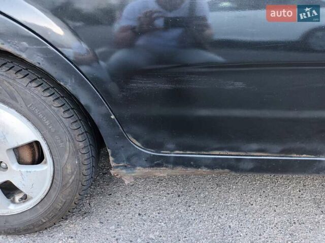 Черный Шевроле Авео, объемом двигателя 1.5 л и пробегом 322 тыс. км за 1900 $, фото 7 на Automoto.ua