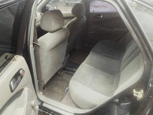 Черный Шевроле Авео, объемом двигателя 1.8 л и пробегом 280 тыс. км за 2750 $, фото 3 на Automoto.ua