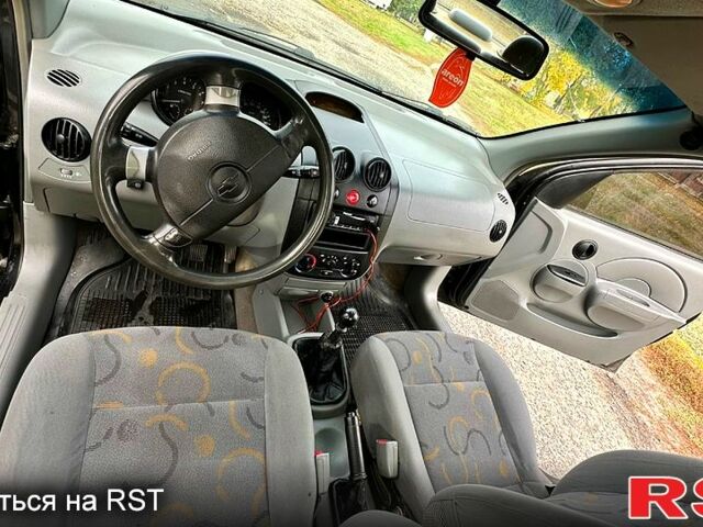 Черный Шевроле Авео, объемом двигателя 1.5 л и пробегом 175 тыс. км за 2600 $, фото 5 на Automoto.ua