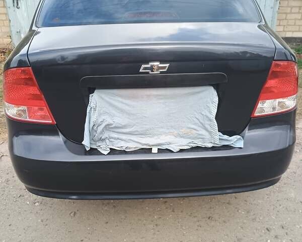 Черный Шевроле Авео, объемом двигателя 1.5 л и пробегом 193 тыс. км за 2700 $, фото 5 на Automoto.ua