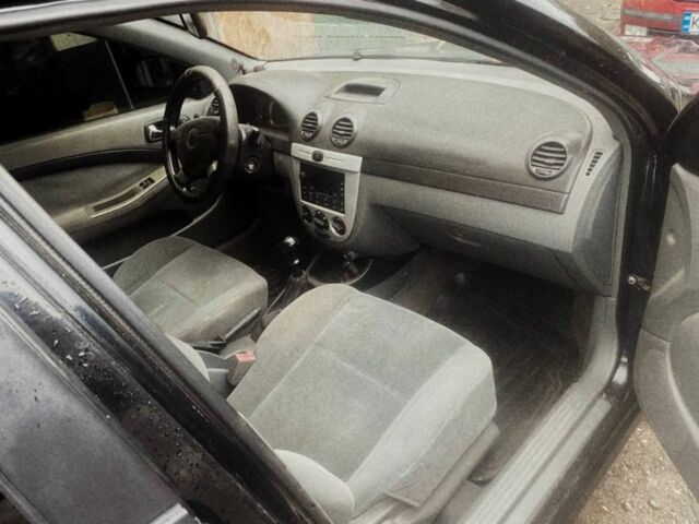 Черный Шевроле Авео, объемом двигателя 1.8 л и пробегом 280 тыс. км за 2750 $, фото 1 на Automoto.ua