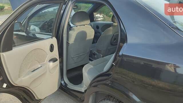 Черный Шевроле Авео, объемом двигателя 1.5 л и пробегом 260 тыс. км за 3300 $, фото 4 на Automoto.ua