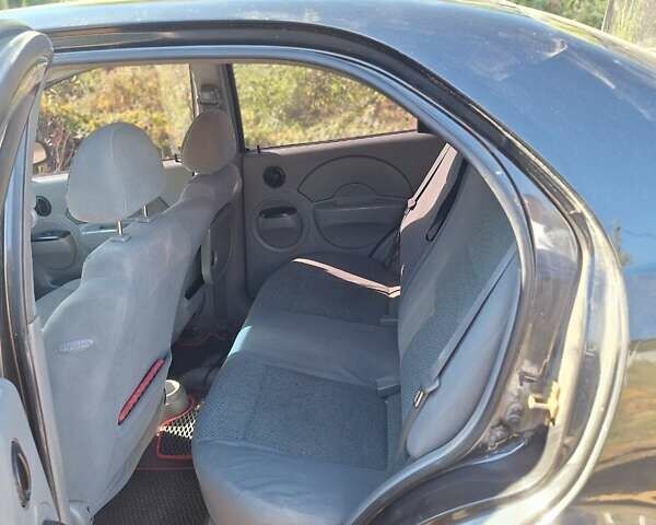 Черный Шевроле Авео, объемом двигателя 1.5 л и пробегом 225 тыс. км за 2300 $, фото 4 на Automoto.ua