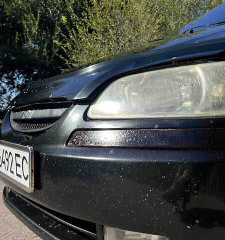 Черный Шевроле Авео, объемом двигателя 1.5 л и пробегом 410 тыс. км за 2500 $, фото 4 на Automoto.ua