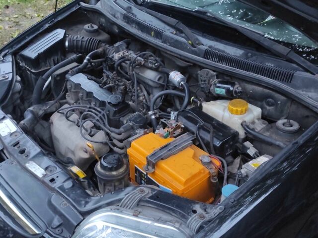 Черный Шевроле Авео, объемом двигателя 1.5 л и пробегом 170 тыс. км за 3108 $, фото 19 на Automoto.ua