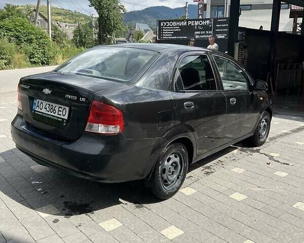 Черный Шевроле Авео, объемом двигателя 1.5 л и пробегом 170 тыс. км за 2200 $, фото 1 на Automoto.ua