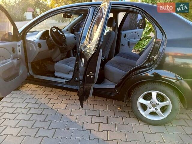 Черный Шевроле Авео, объемом двигателя 1.5 л и пробегом 195 тыс. км за 2650 $, фото 14 на Automoto.ua