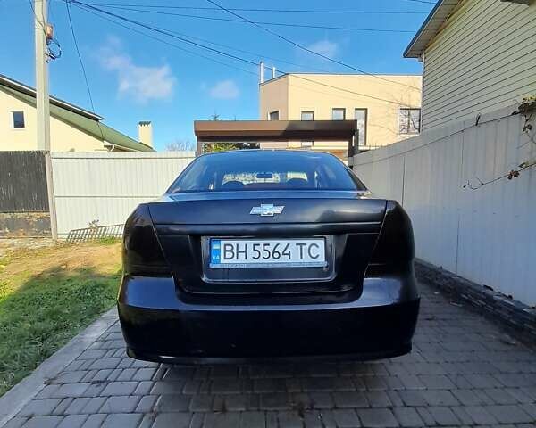 Черный Шевроле Авео, объемом двигателя 1.5 л и пробегом 210 тыс. км за 4000 $, фото 3 на Automoto.ua
