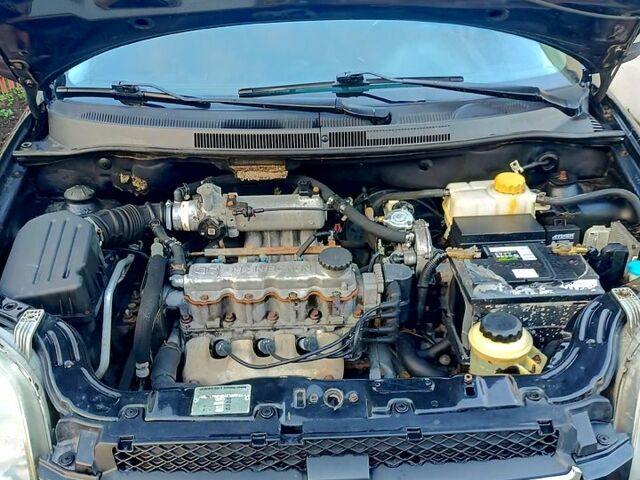 Черный Шевроле Авео, объемом двигателя 1.5 л и пробегом 380 тыс. км за 3100 $, фото 4 на Automoto.ua