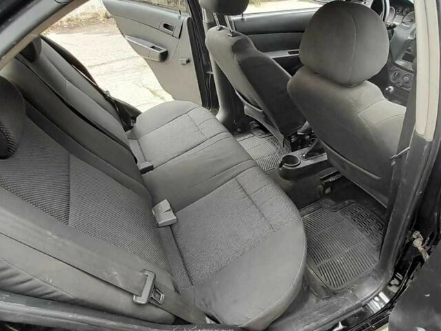 Черный Шевроле Авео, объемом двигателя 1.5 л и пробегом 186 тыс. км за 3000 $, фото 5 на Automoto.ua