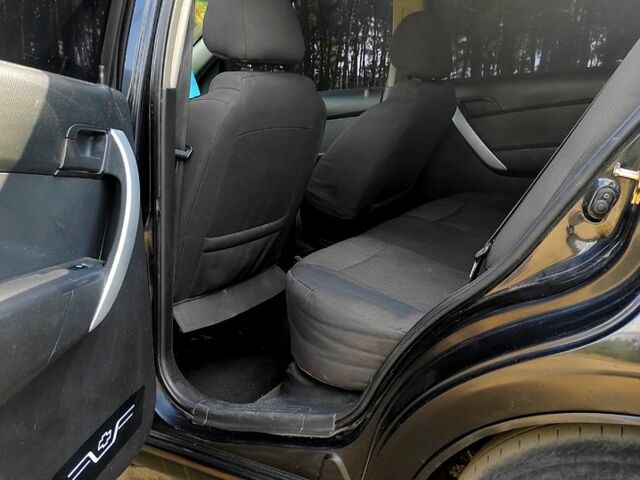 Черный Шевроле Авео, объемом двигателя 1.5 л и пробегом 220 тыс. км за 3200 $, фото 3 на Automoto.ua