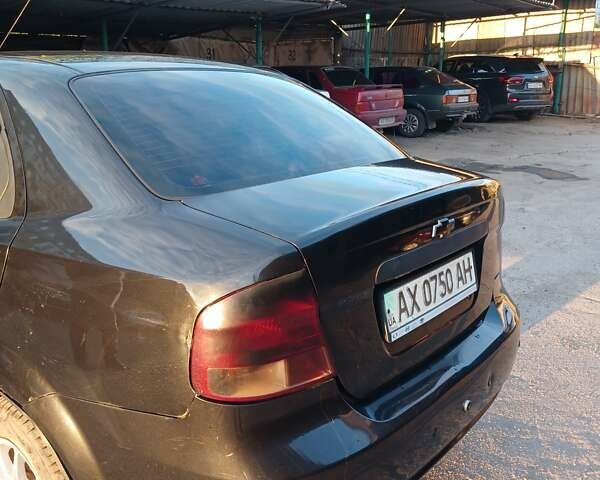 Черный Шевроле Авео, объемом двигателя 1.5 л и пробегом 400 тыс. км за 1453 $, фото 12 на Automoto.ua