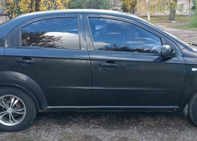 Чорний Шевроле Авео, об'ємом двигуна 1.5 л та пробігом 130 тис. км за 3011 $, фото 5 на Automoto.ua