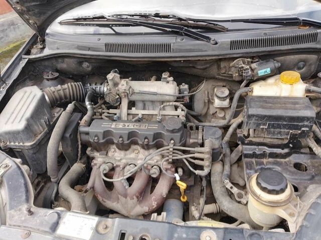 Чорний Шевроле Авео, об'ємом двигуна 1.5 л та пробігом 79 тис. км за 2200 $, фото 1 на Automoto.ua