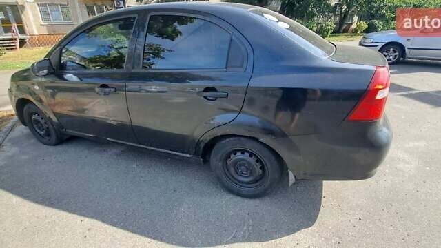 Черный Шевроле Авео, объемом двигателя 1.5 л и пробегом 208 тыс. км за 2300 $, фото 2 на Automoto.ua