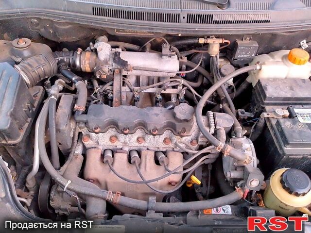 Чорний Шевроле Авео, об'ємом двигуна 1.5 л та пробігом 250 тис. км за 3400 $, фото 3 на Automoto.ua