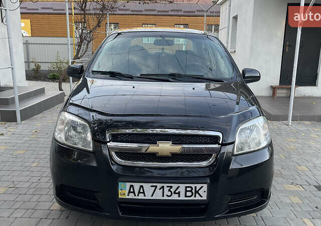 Черный Шевроле Авео, объемом двигателя 1.5 л и пробегом 193 тыс. км за 3800 $, фото 1 на Automoto.ua