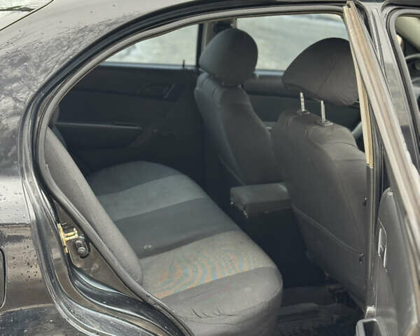Чорний Шевроле Авео, об'ємом двигуна 1.5 л та пробігом 300 тис. км за 2750 $, фото 6 на Automoto.ua