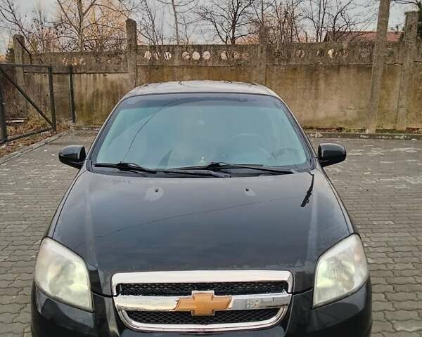 Черный Шевроле Авео, объемом двигателя 1.5 л и пробегом 280 тыс. км за 4350 $, фото 1 на Automoto.ua