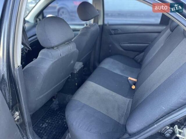 Чорний Шевроле Авео, об'ємом двигуна 1.5 л та пробігом 300 тис. км за 2900 $, фото 13 на Automoto.ua