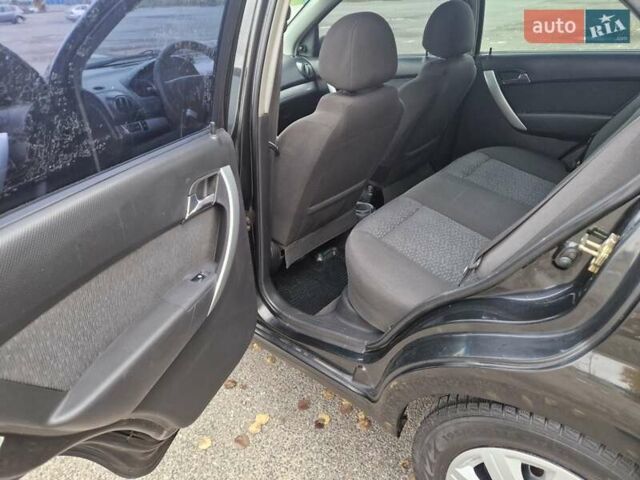 Черный Шевроле Авео, объемом двигателя 1.5 л и пробегом 256 тыс. км за 4600 $, фото 12 на Automoto.ua