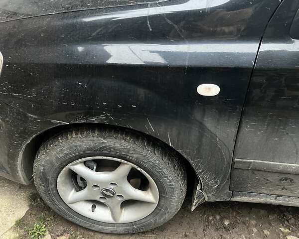 Черный Шевроле Авео, объемом двигателя 1.5 л и пробегом 250 тыс. км за 2699 $, фото 7 на Automoto.ua