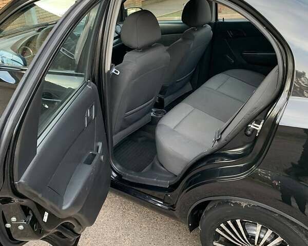 Черный Шевроле Авео, объемом двигателя 1.5 л и пробегом 205 тыс. км за 3650 $, фото 1 на Automoto.ua