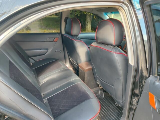 Черный Шевроле Авео, объемом двигателя 1.5 л и пробегом 235 тыс. км за 4500 $, фото 4 на Automoto.ua