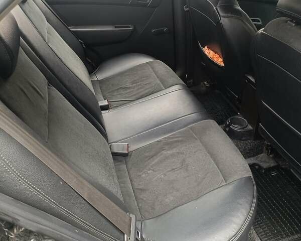 Чорний Шевроле Авео, об'ємом двигуна 1.5 л та пробігом 307 тис. км за 3450 $, фото 6 на Automoto.ua